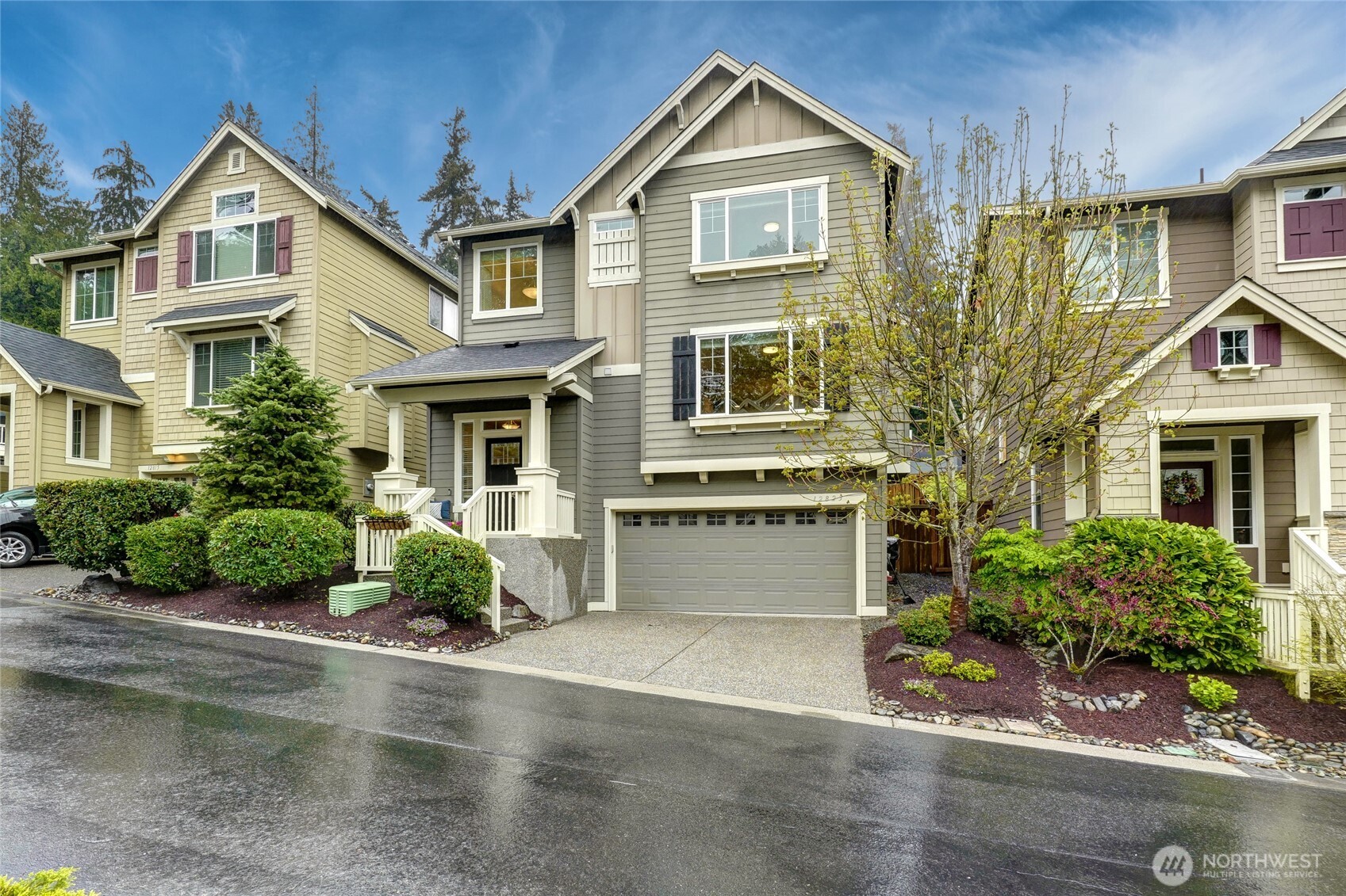 12823 65th Place West Edmonds, WA 98026 - Photo 2 of 32 a front view of a house with a yard