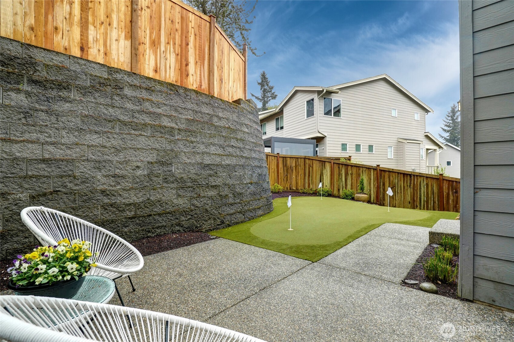 12823 65th Place West Edmonds, WA 98026 - Photo 30 of 32 a view of a house with a patio