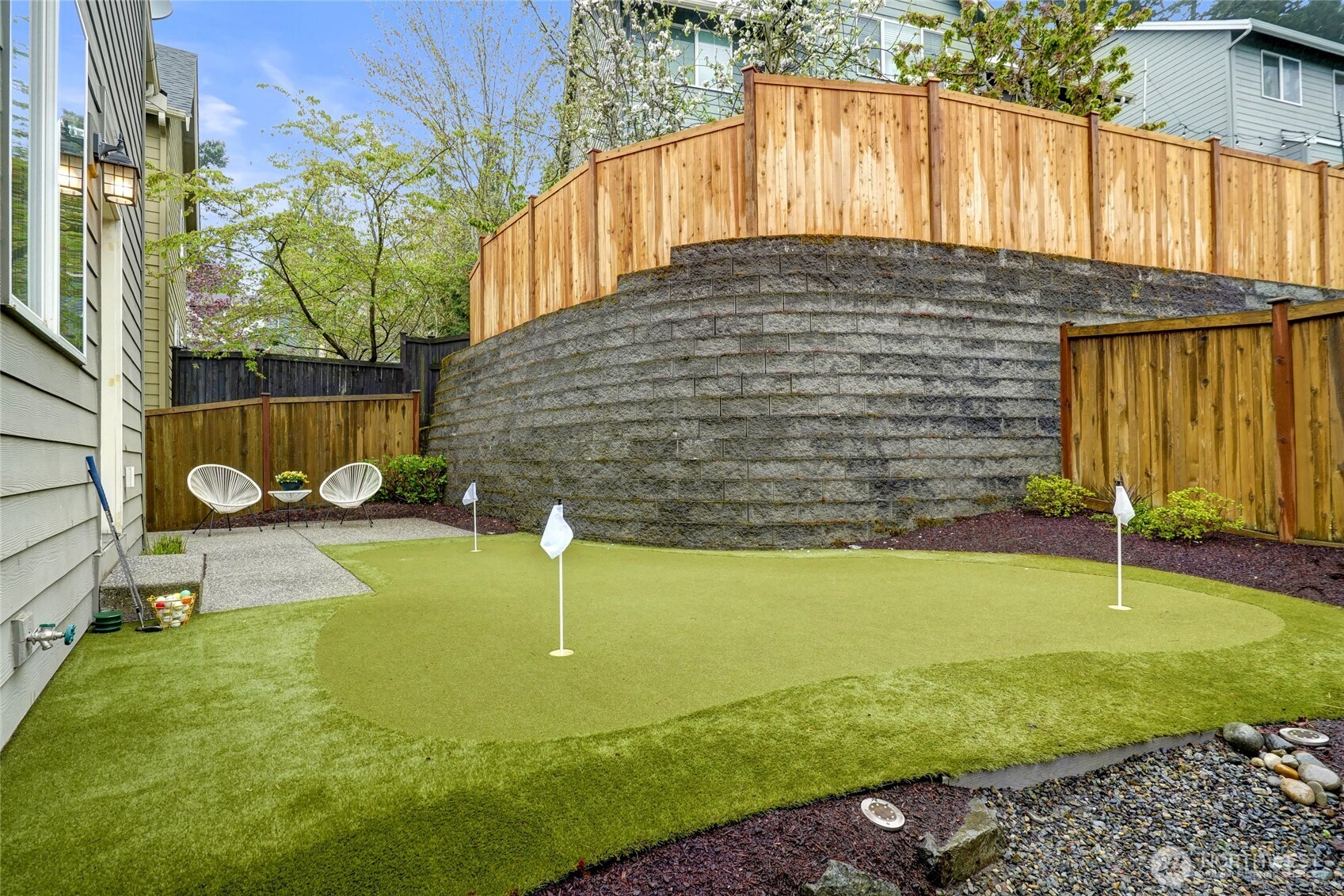 12823 65th Place West Edmonds, WA 98026 - Photo 32 of 32 a backyard of a house with lots of green space