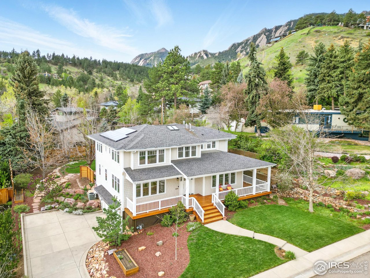 1380 Bluebell Avenue Boulder, CO 80302 - Photo 1 of 1 an aerial view of a house with a big yard