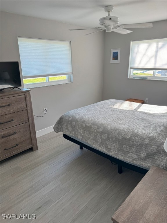 6102 Park Road Fort Myers, FL 33908 - Photo 11 of 18 a bedroom with a bed and a window