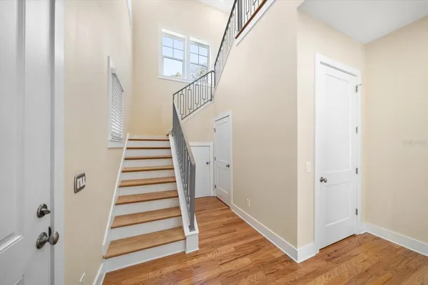 a view of entryway with wooden floor