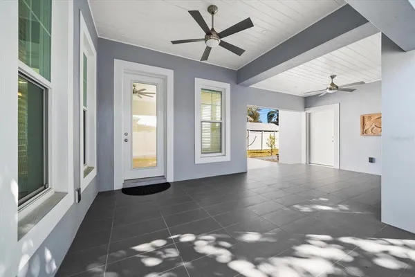 a view of a swimming pool with a patio