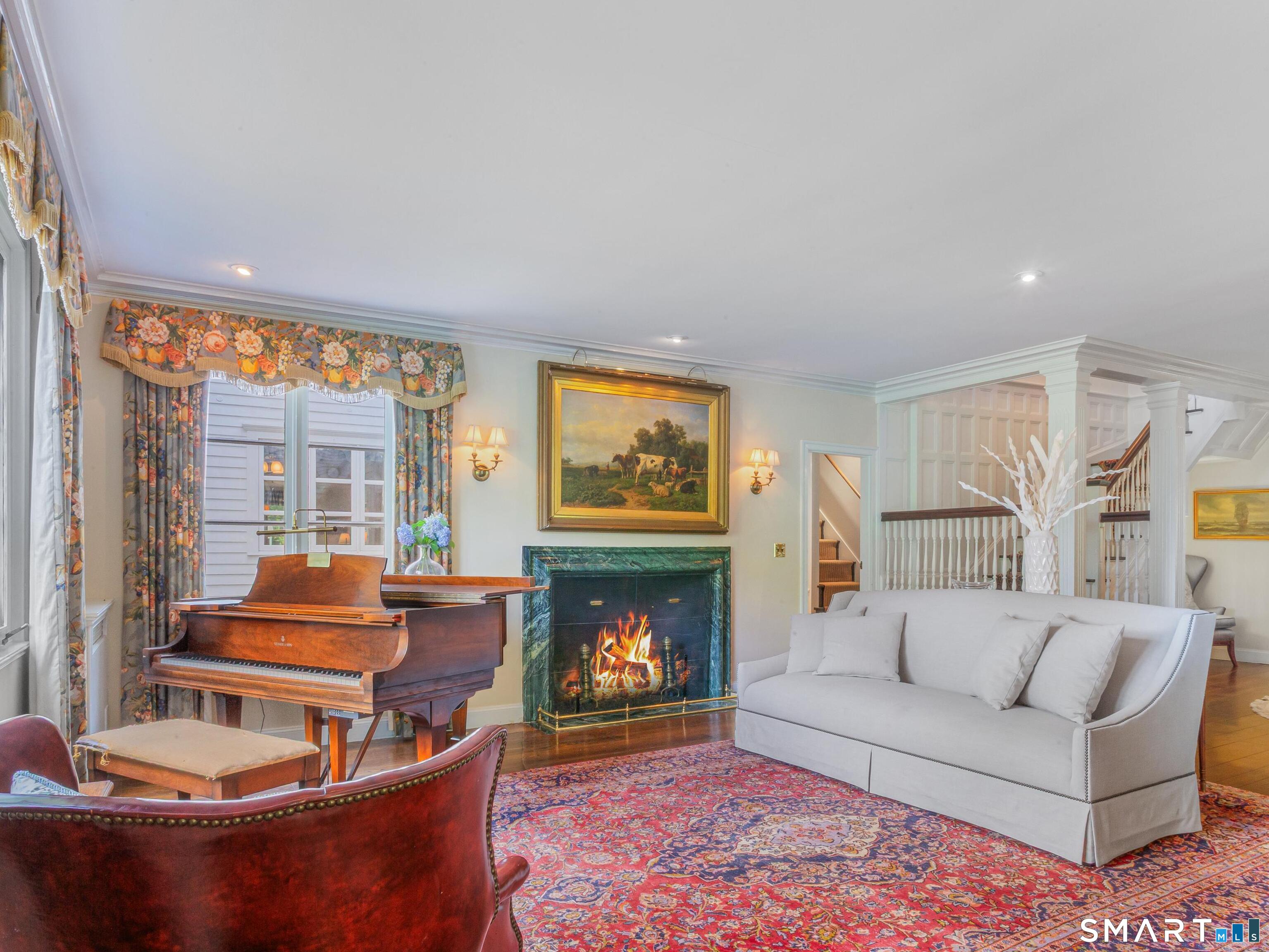 433 Wrights Crossing Road Pomfret Center, CT 06259 - Photo 7 of 40 Step right into the Front Parlor - like stepping back in time! This classy space is all about old-fashioned charm and soaking in the hirstory. The design is timeless, and the gas fireplace makes it a comfy sitting room.