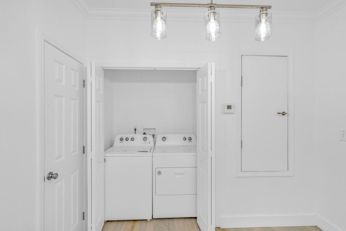 98980 Overseas Highway Key Largo, FL 33037 - Photo 2 of 12 a bathroom with a sink and mirror