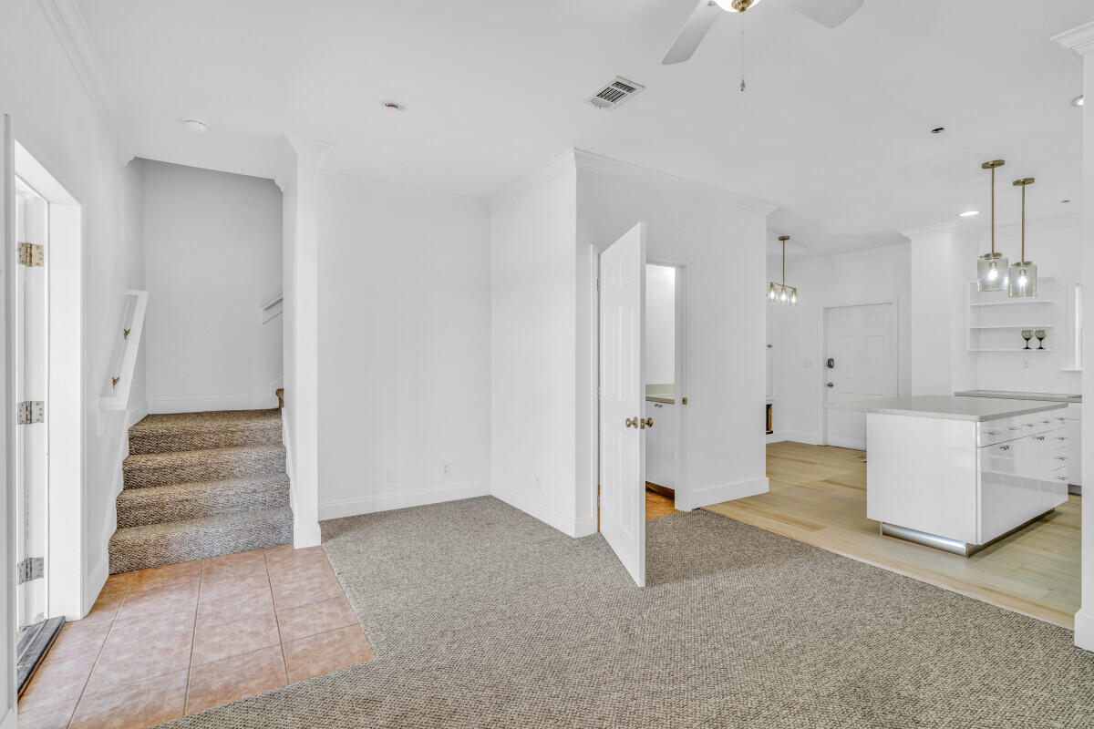 98980 Overseas Highway Key Largo, FL 33037 - Photo 4 of 12 a view of a room with large windows and cabinet