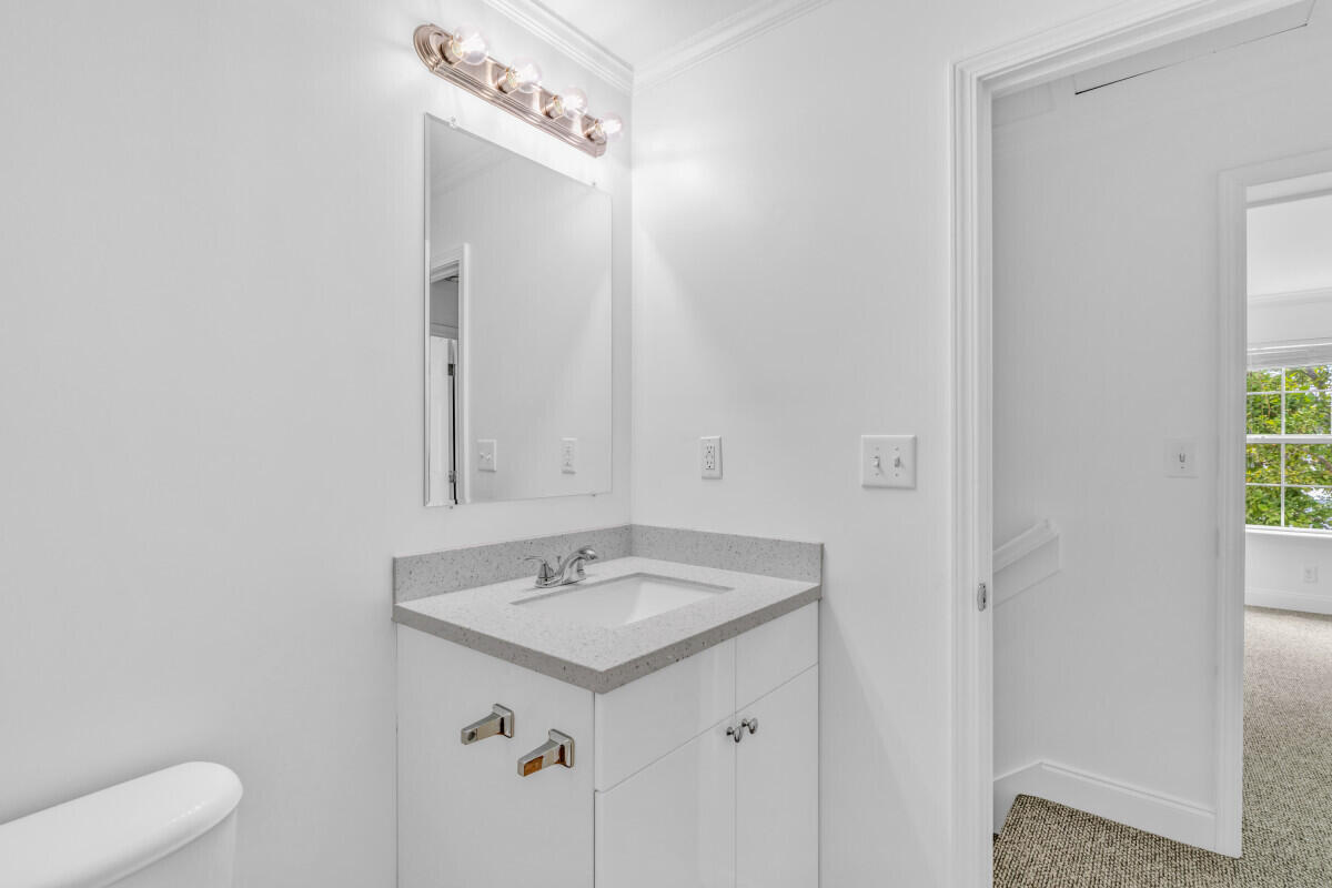 98980 Overseas Highway Key Largo, FL 33037 - Photo 10 of 12 a bathroom with a sink and a toilet