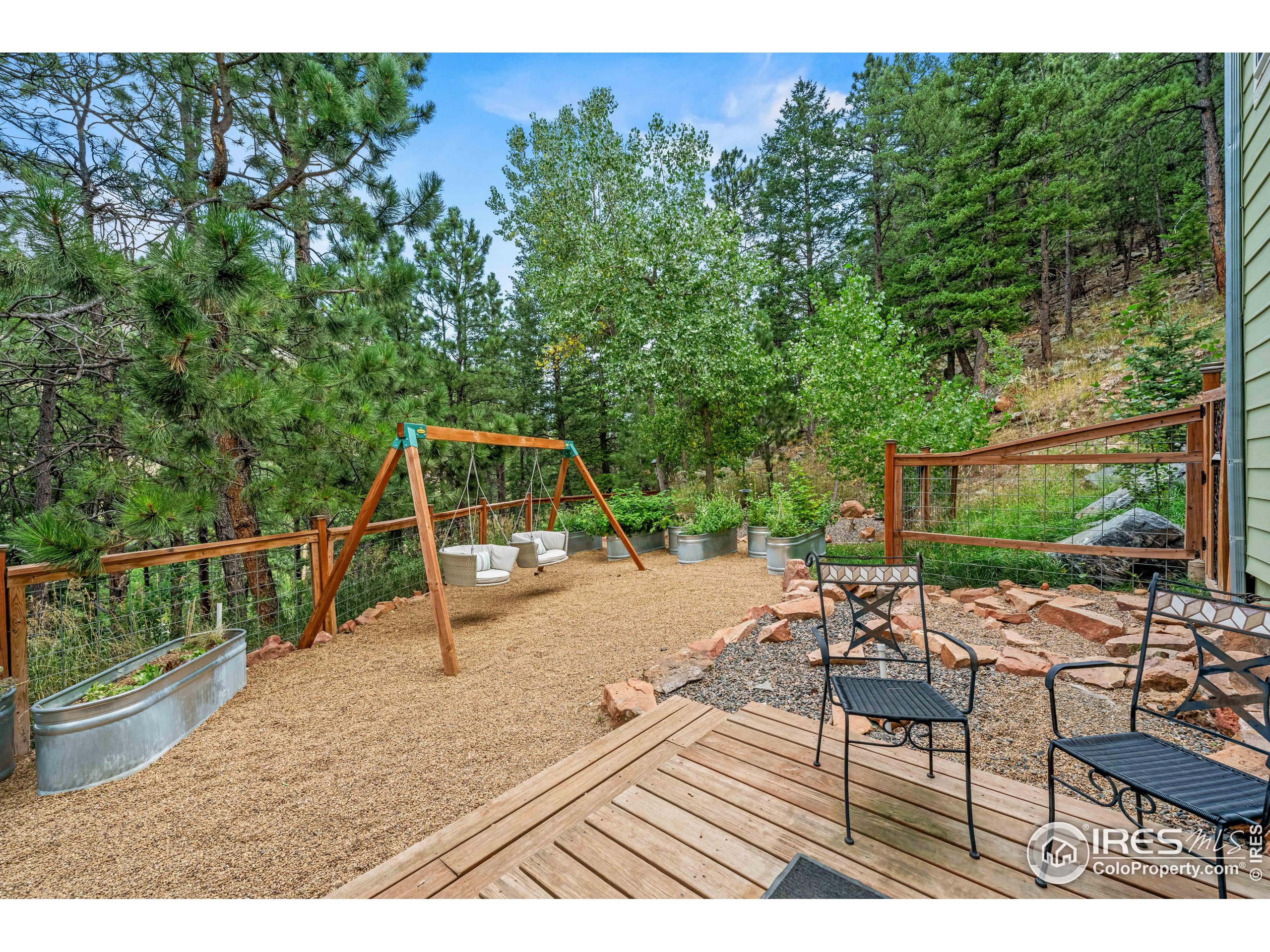 301 Valley Lane Boulder, CO 80302 - Photo 35 of 46 a view of a roof deck with chair and table