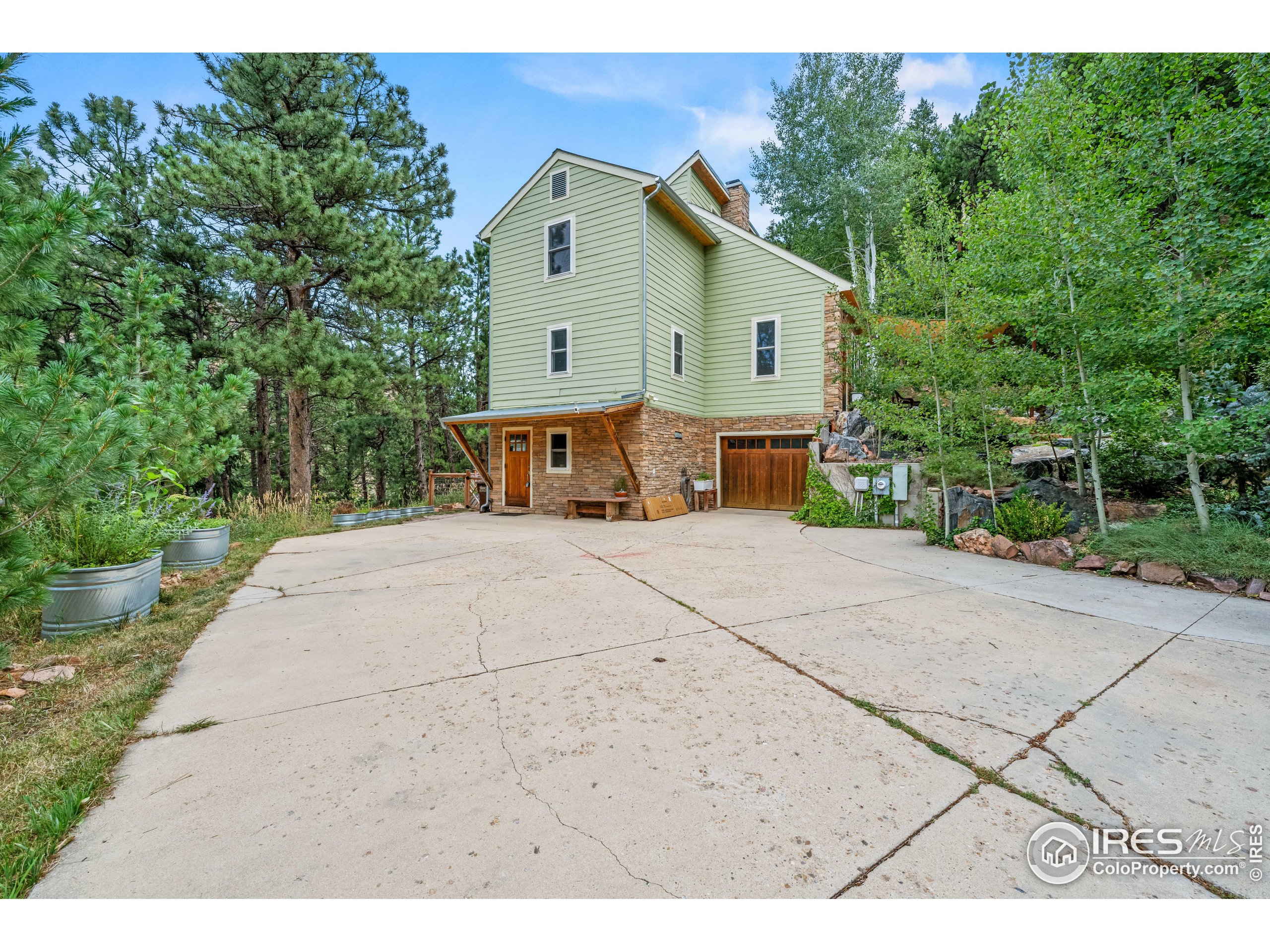 301 Valley Lane Boulder, CO 80302 - Photo 38 of 46 a view of house and outdoor space with yard