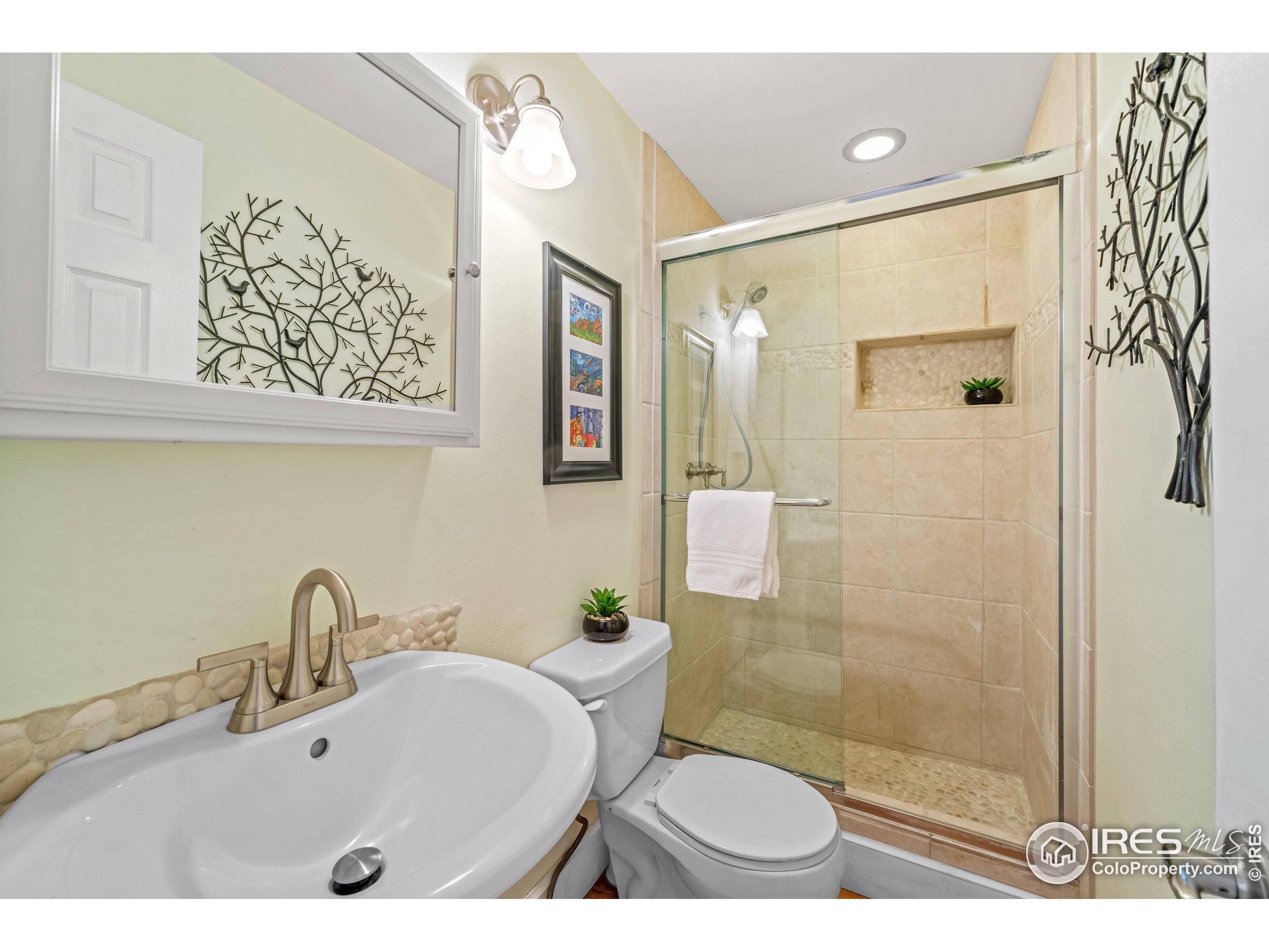 301 Valley Lane Boulder, CO 80302 - Photo 9 of 46 a bathroom with a sink and a shower