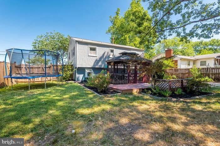 10019 Lomond Drive Manassas, VA 20109 - Photo 14 of 31 a view of house with a yard