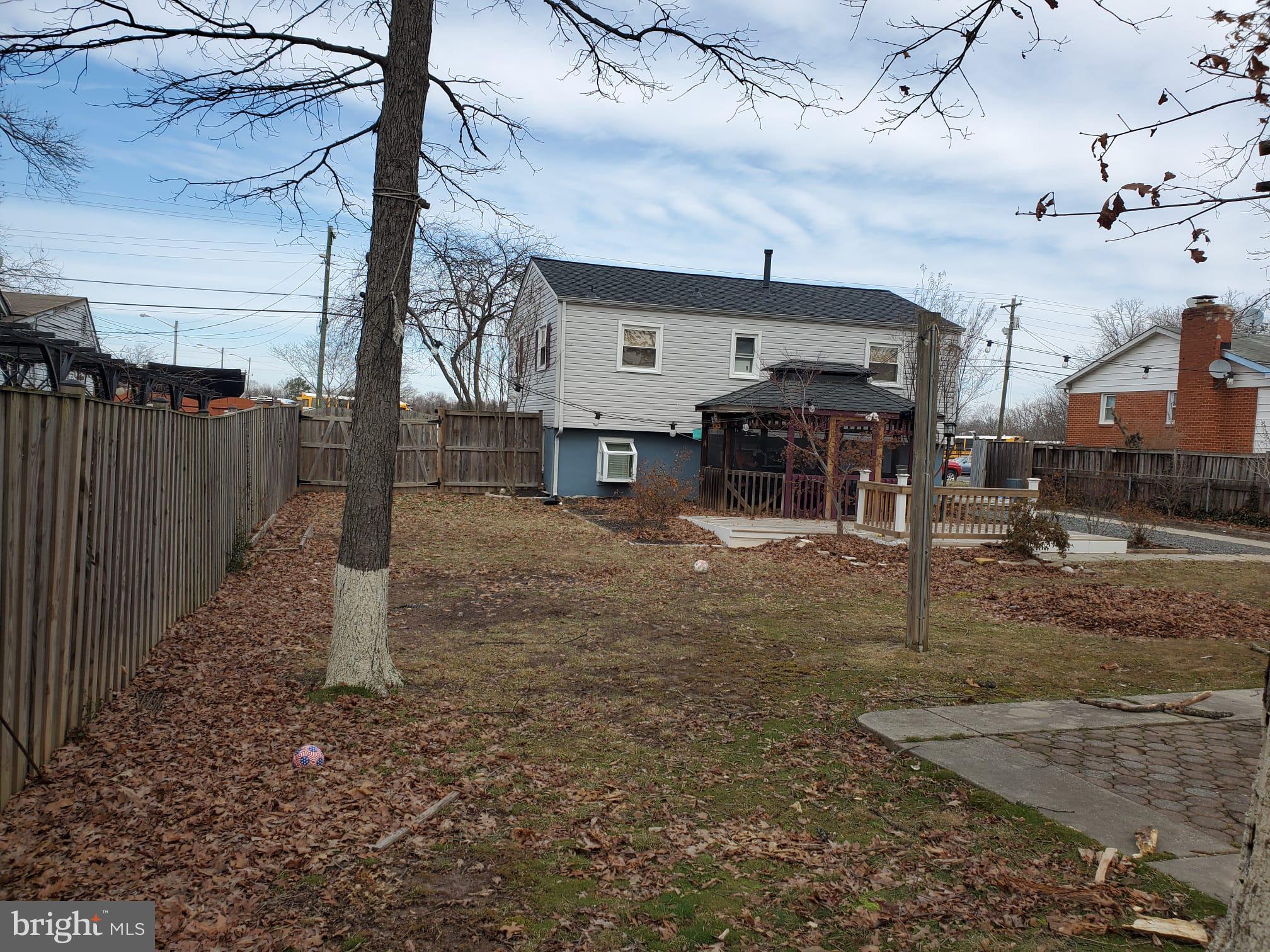 10019 Lomond Drive Manassas, VA 20109 - Photo 30 of 31 a view of a yard in front of a house