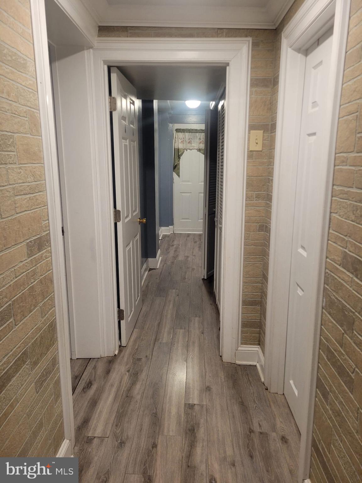 10019 Lomond Drive Manassas, VA 20109 - Photo 7 of 31 a view of hallway with wooden floor