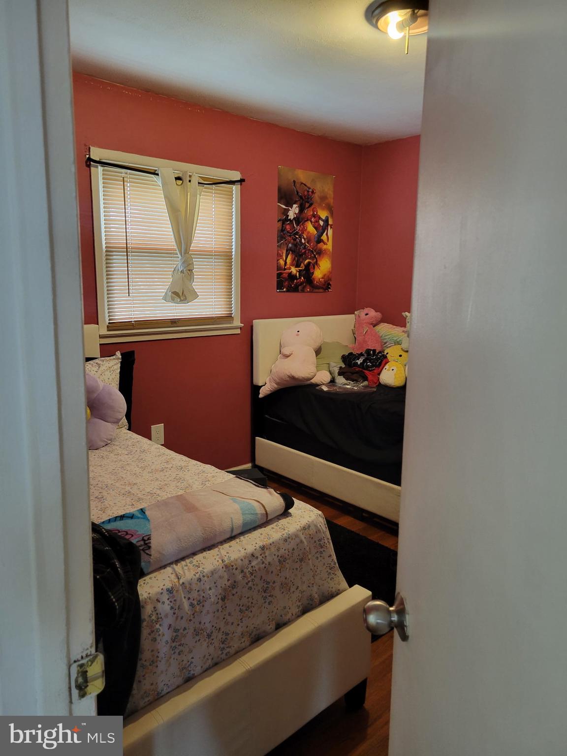 10019 Lomond Drive Manassas, VA 20109 - Photo 9 of 31 a bedroom with a bed and window