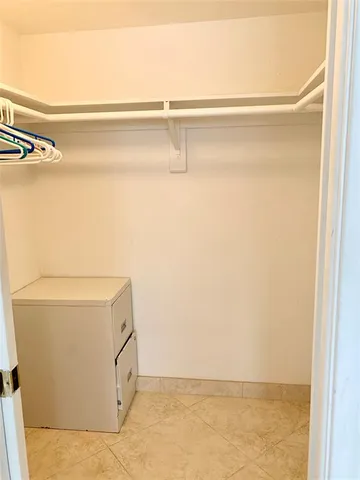 a view of small space with racks on the wall