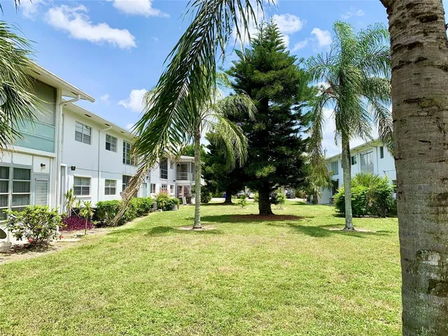 a house with garden in front of it