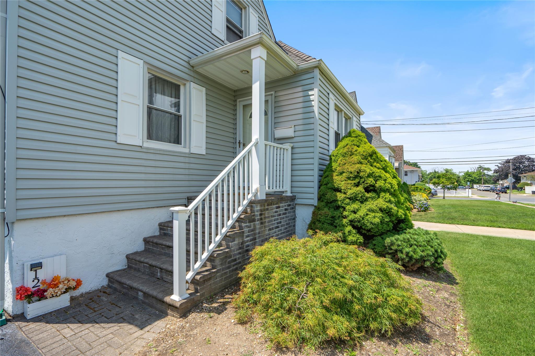 12 Westmoreland Road Merrick, NY 11566 - Photo 11 of 42 a view of a house with a yard
