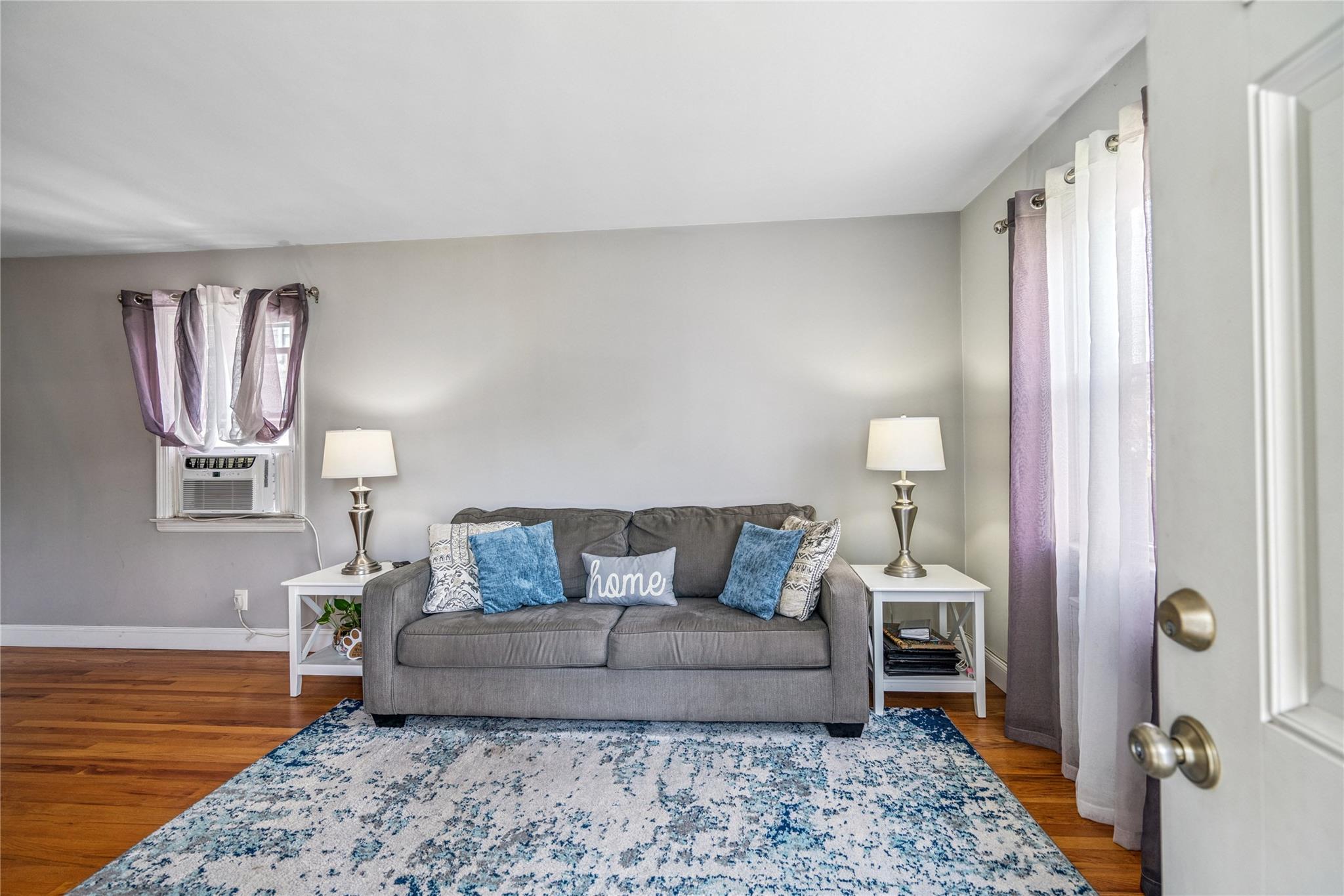 12 Westmoreland Road Merrick, NY 11566 - Photo 13 of 42 a living room with furniture and wooden floor