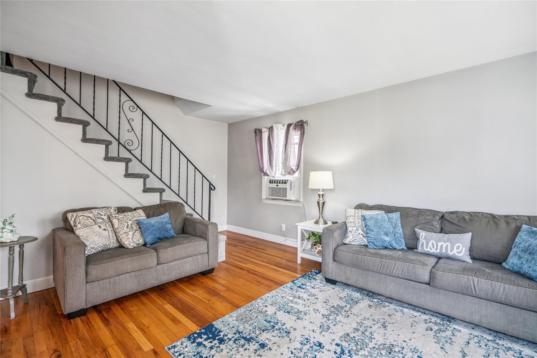 12 Westmoreland Road Merrick, NY 11566 - Photo 14 of 42 a living room with furniture and a couch