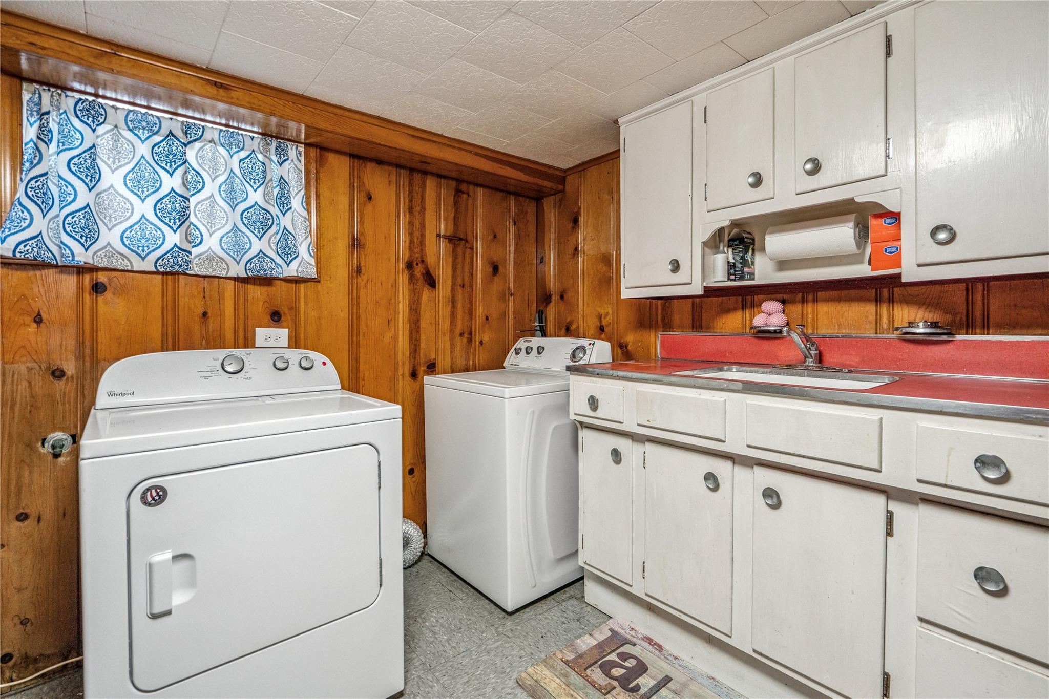 12 Westmoreland Road Merrick, NY 11566 - Photo 28 of 42 a utility room with dryer and washer