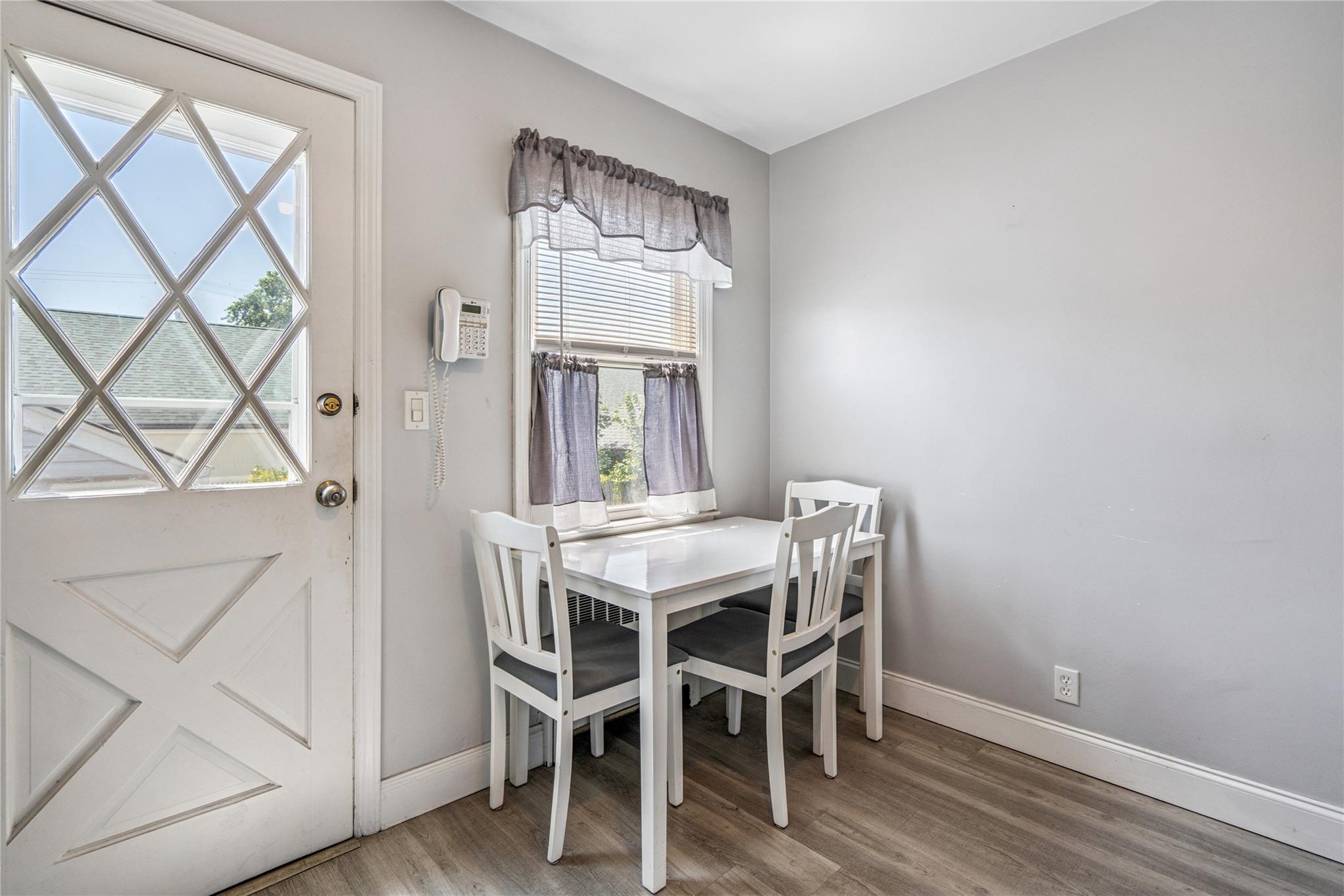 12 Westmoreland Road Merrick, NY 11566 - Photo 34 of 42 a dining room with furniture and window
