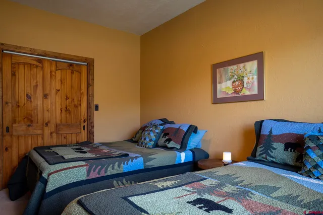 a view of workspace with wooden floor windows