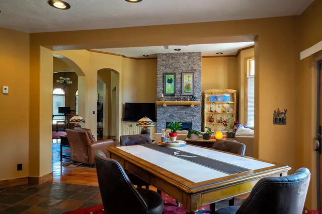 a kitchen with stainless steel appliances granite countertop a sink and cabinets