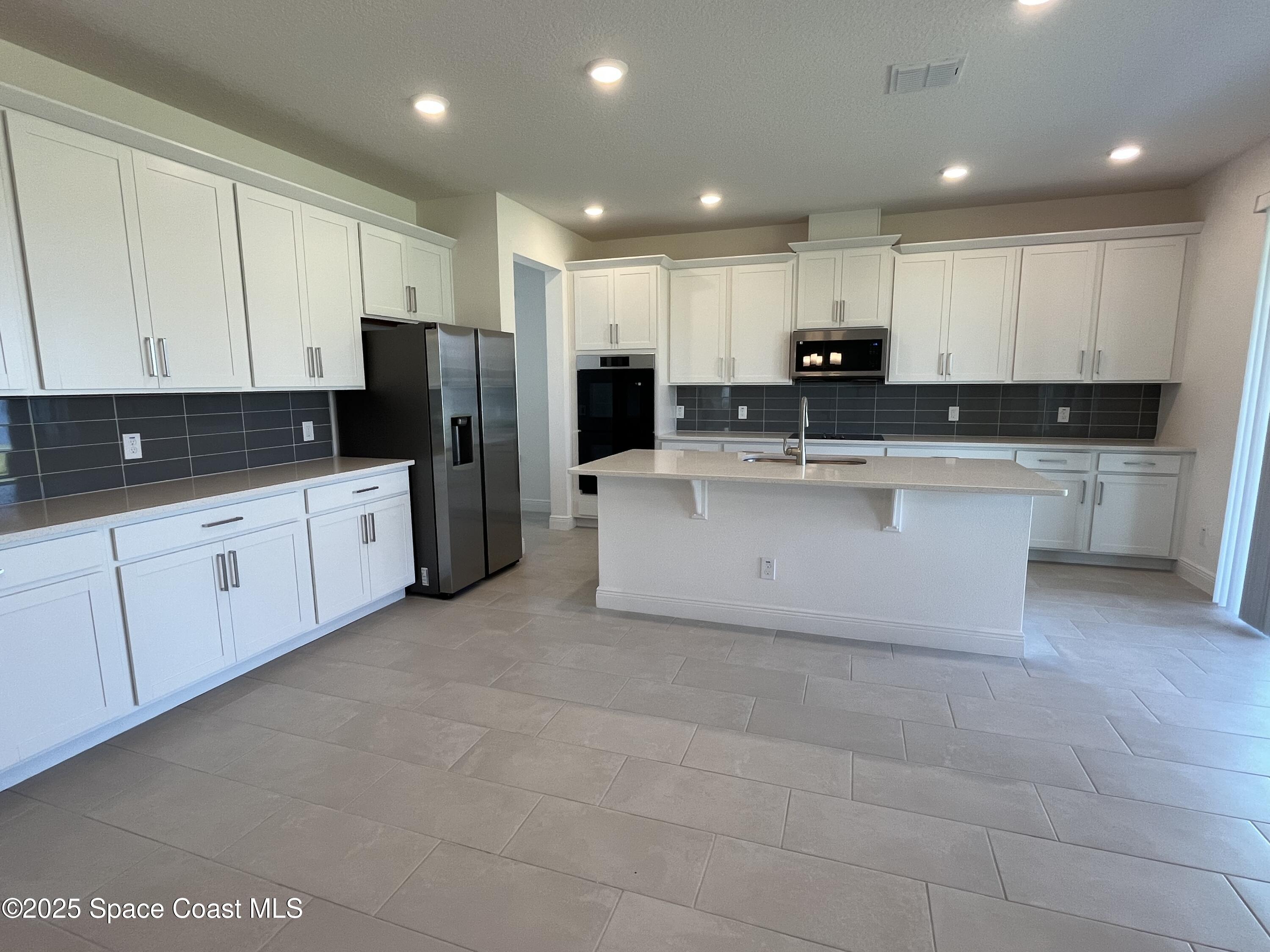 1163 Killian Drive Palm Bay, FL 32905 - Photo 3 of 14 Kitchen