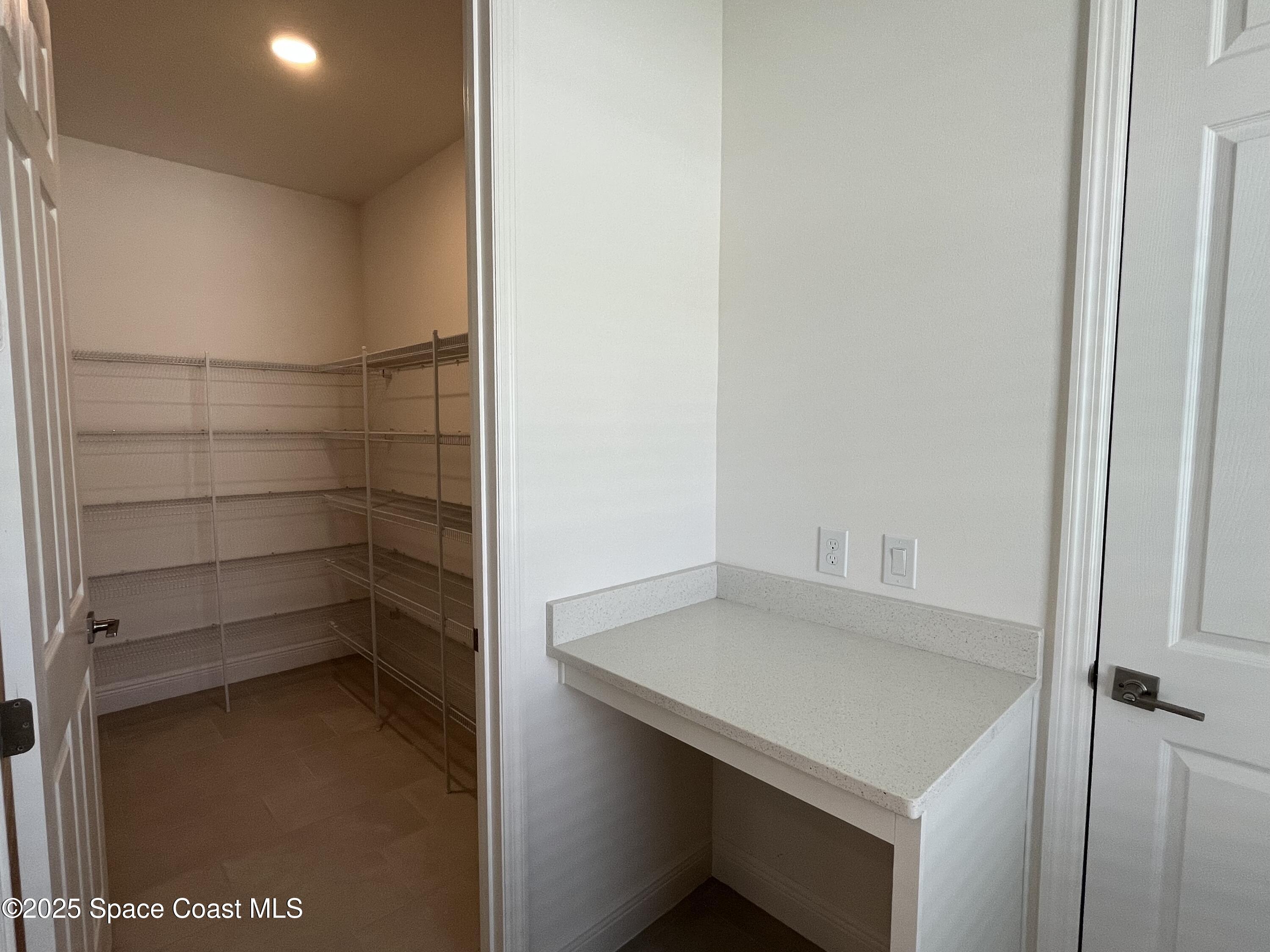 1163 Killian Drive Palm Bay, FL 32905 - Photo 7 of 14 Pantry Closet
