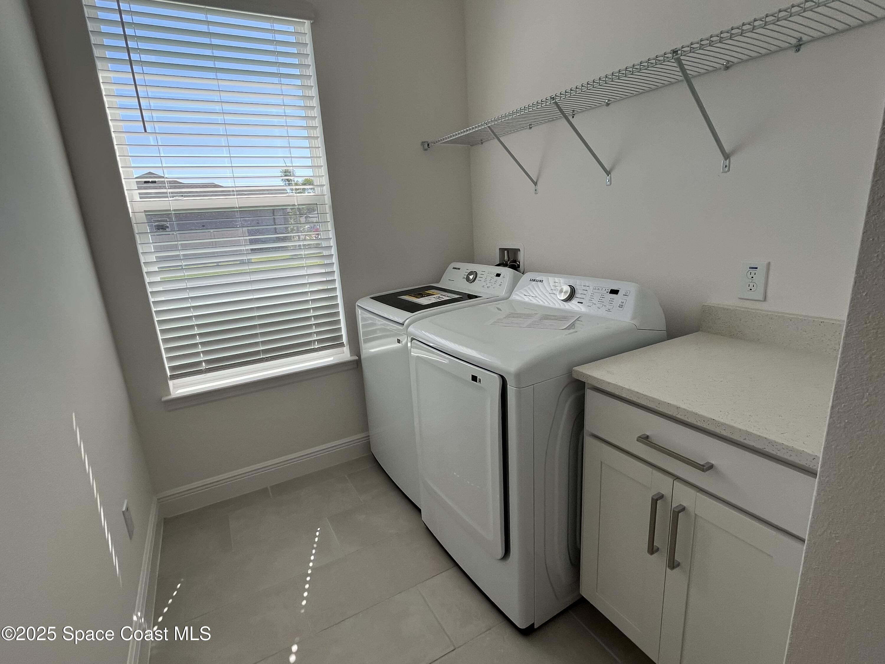 1163 Killian Drive Palm Bay, FL 32905 - Photo 9 of 14 Laundry Room