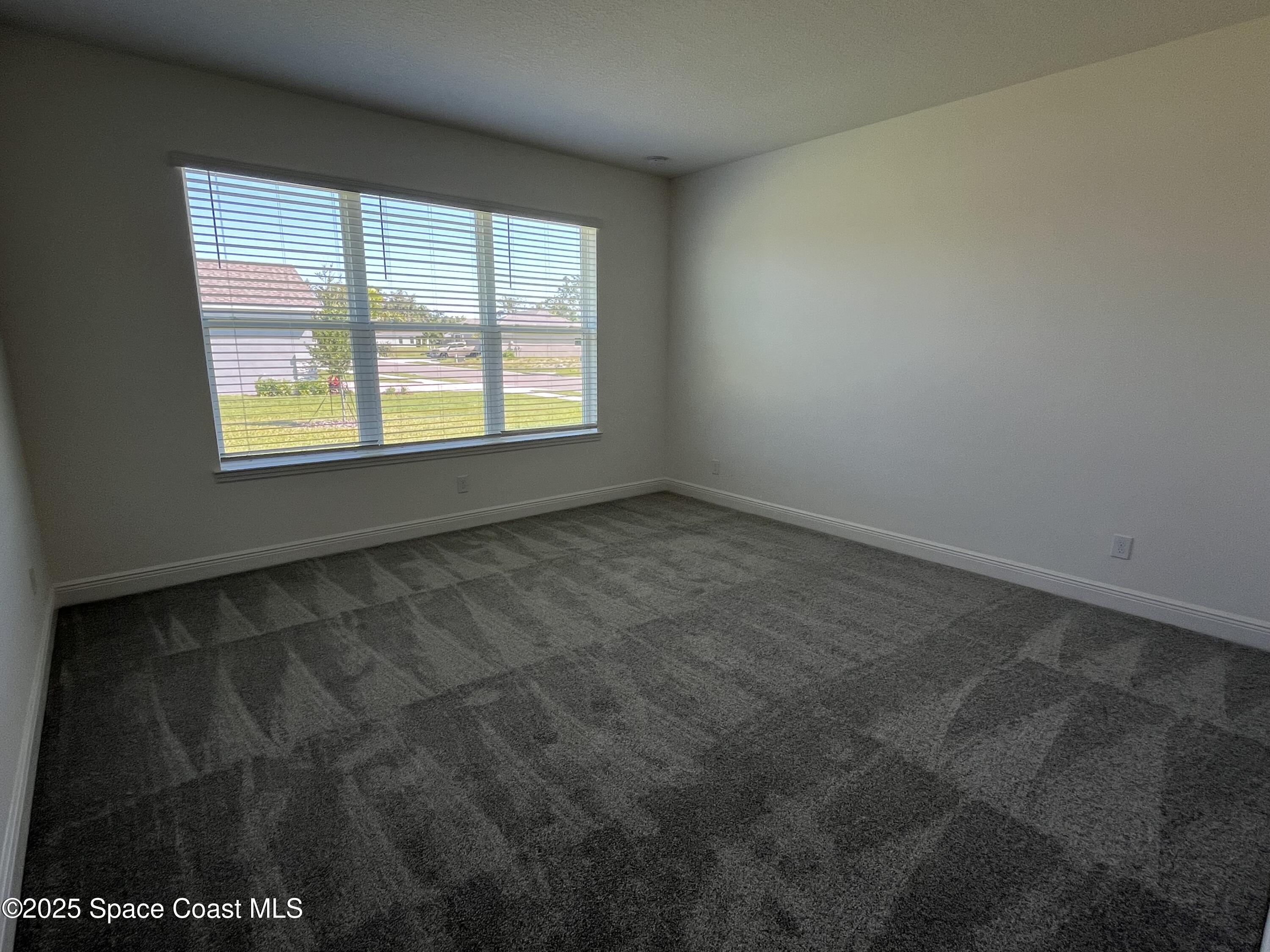 1163 Killian Drive Palm Bay, FL 32905 - Photo 10 of 14 Primary Bedroom