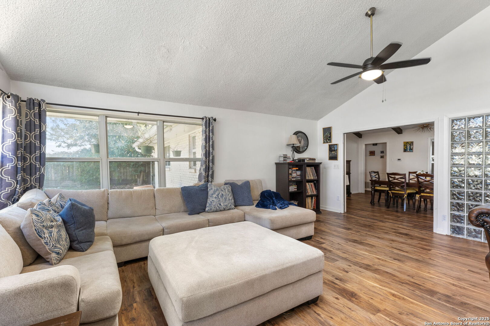 713 Fawndale Lane Windcrest, TX 78239 - Photo 17 of 31 a living room with furniture and a large window