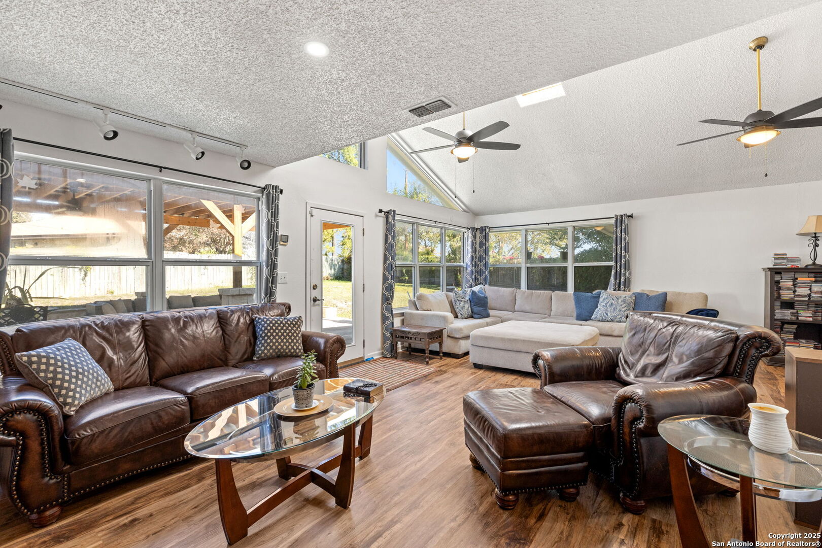 713 Fawndale Lane Windcrest, TX 78239 - Photo 19 of 31 a living room with furniture and a large window