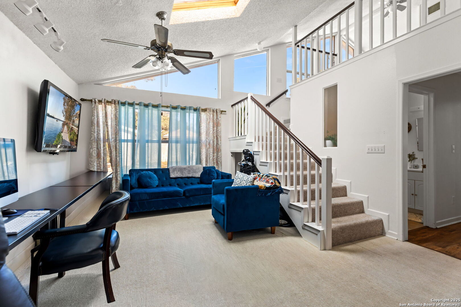 713 Fawndale Lane Windcrest, TX 78239 - Photo 21 of 31 a living room with furniture and a flat screen tv