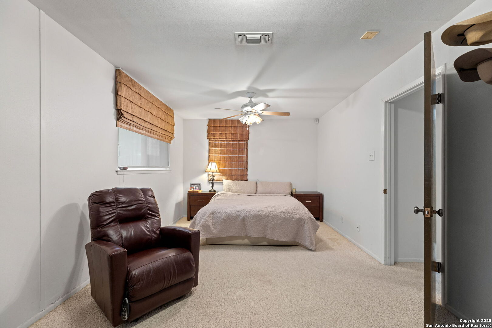 713 Fawndale Lane Windcrest, TX 78239 - Photo 24 of 31 a bedroom with bed and window