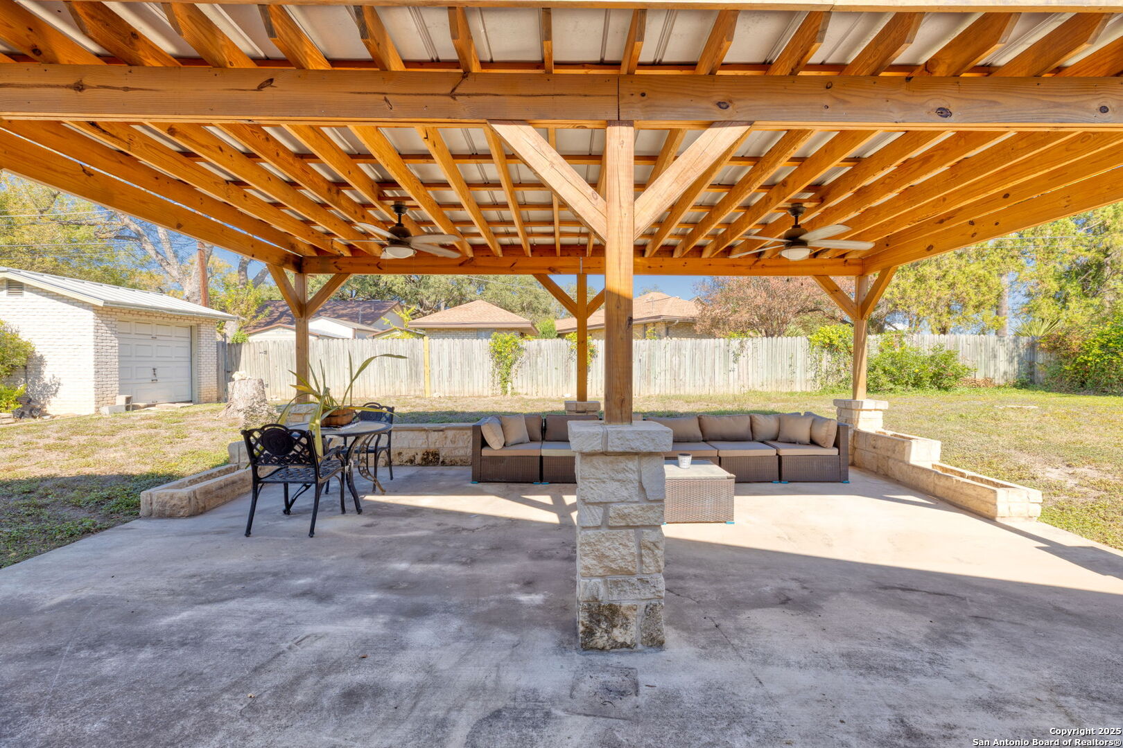 713 Fawndale Lane Windcrest, TX 78239 - Photo 28 of 31 a living room with fireplace furniture and a large window