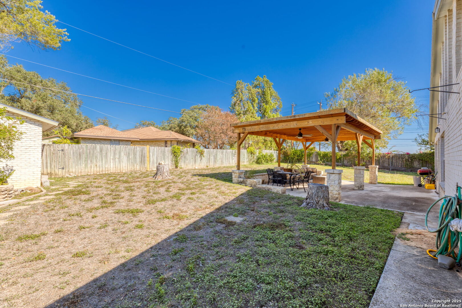 713 Fawndale Lane Windcrest, TX 78239 - Photo 29 of 31 a view of a house with backyard and sitting area