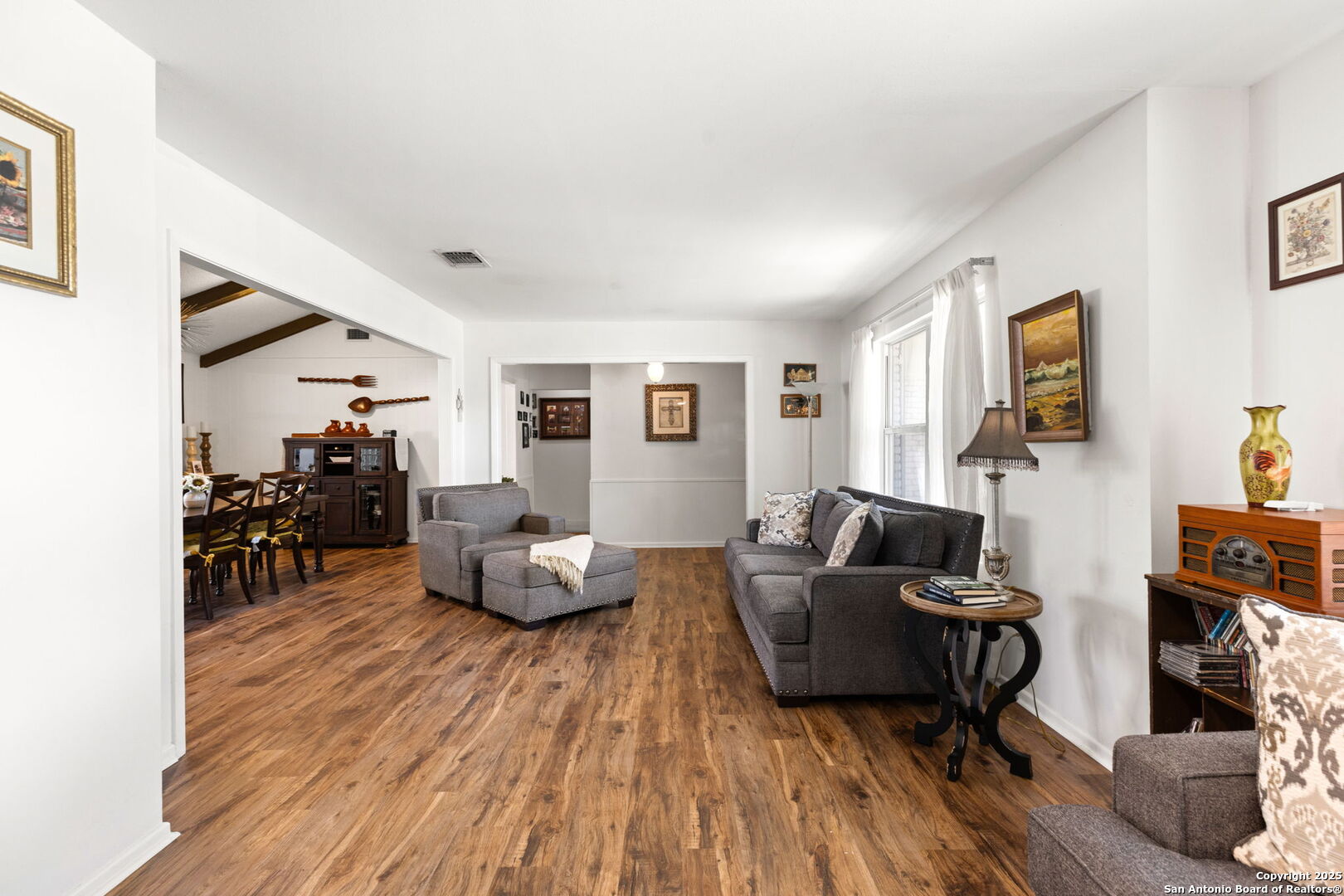 713 Fawndale Lane Windcrest, TX 78239 - Photo 6 of 31 a living room with furniture and wooden floor