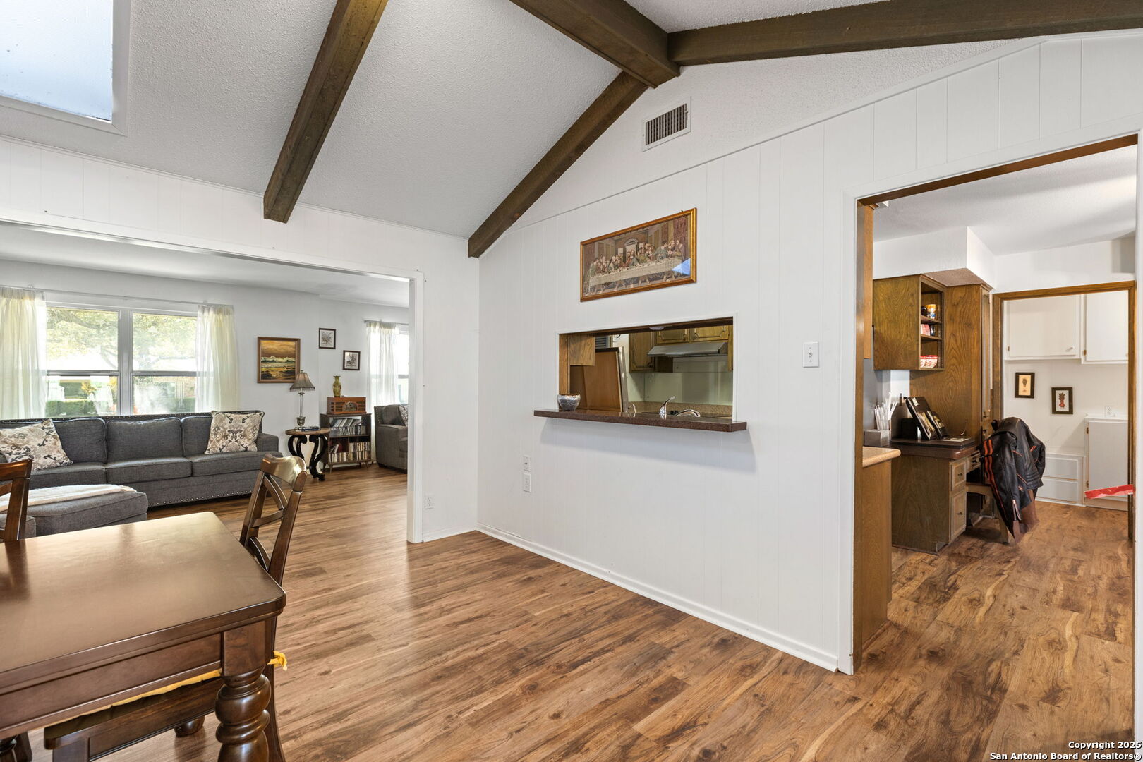 713 Fawndale Lane Windcrest, TX 78239 - Photo 9 of 31 a living room with furniture and a flat screen tv