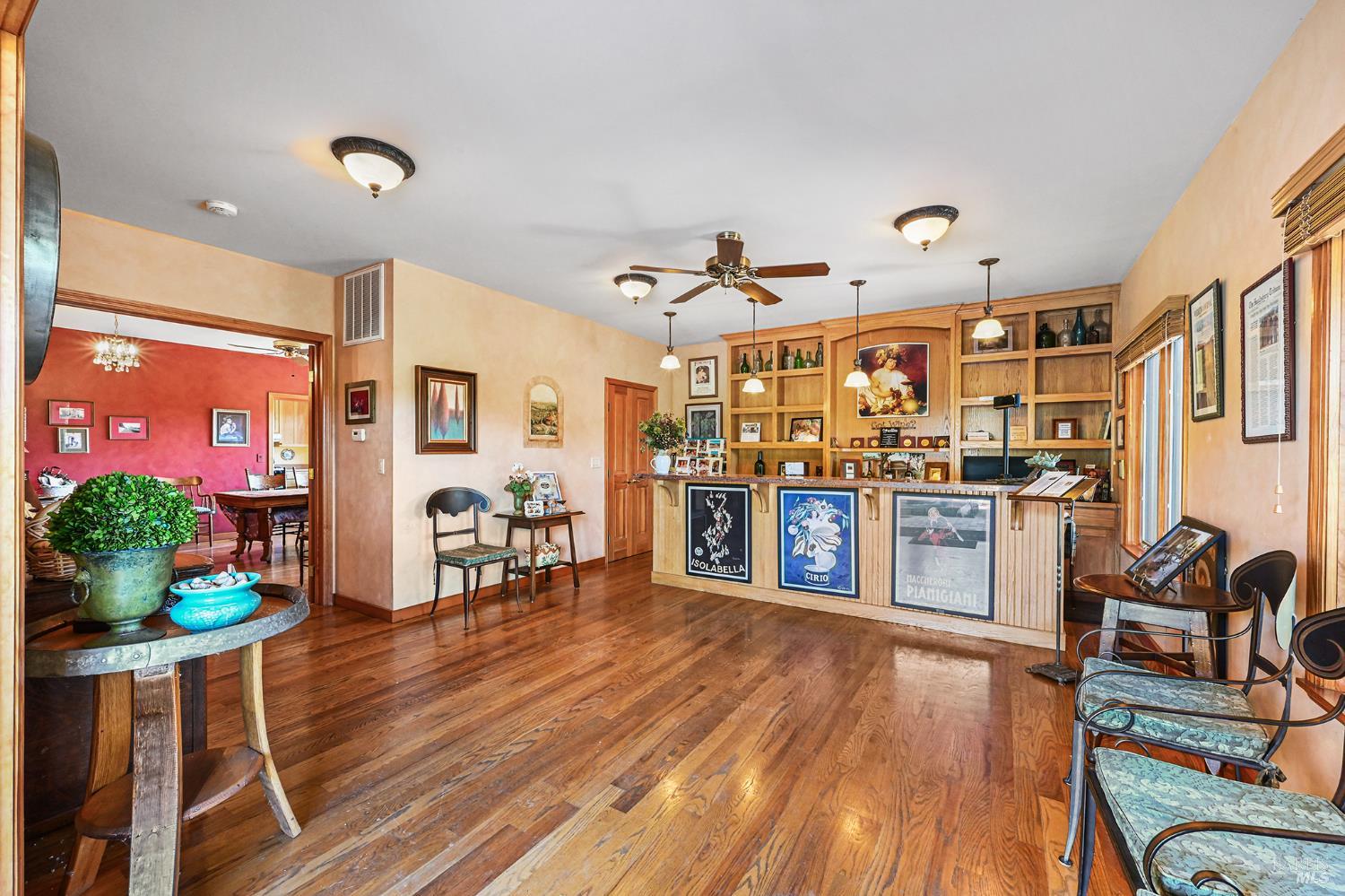 5143 Dry Creek Road Healdsburg, CA 95448 - Photo 21 of 85 a living room filled with lots of furniture and wooden floors