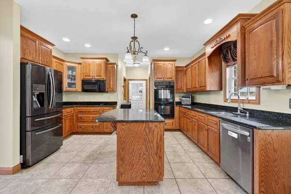 a view of a livingroom with furniture and toys