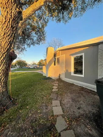 a backyard of a house with lots of green space
