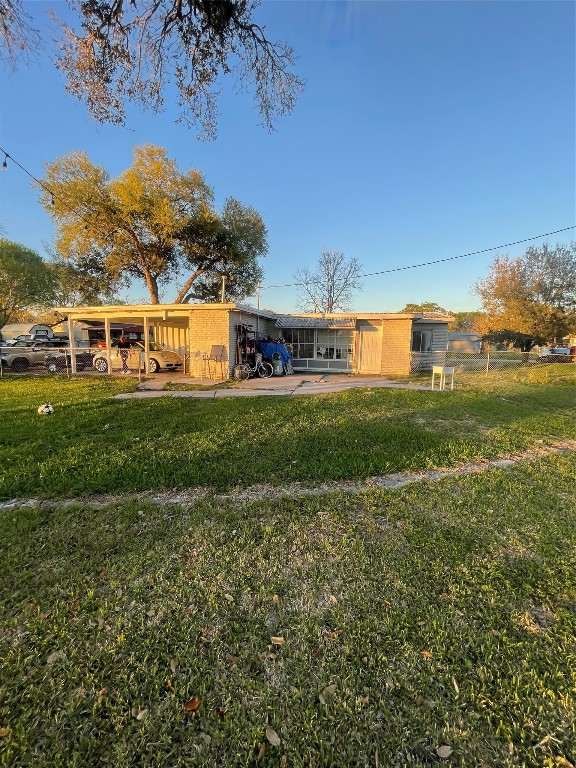611 Sarah Street Edna, TX 77957 - Photo 30 of 31 a view of a house with a big yard