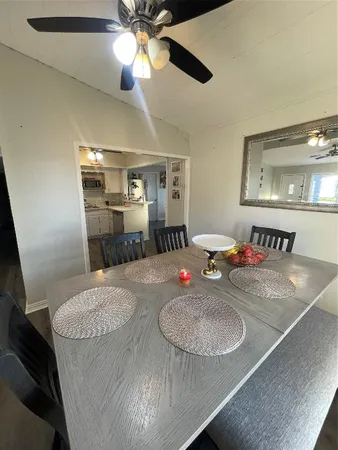 a view of a dining room with furniture
