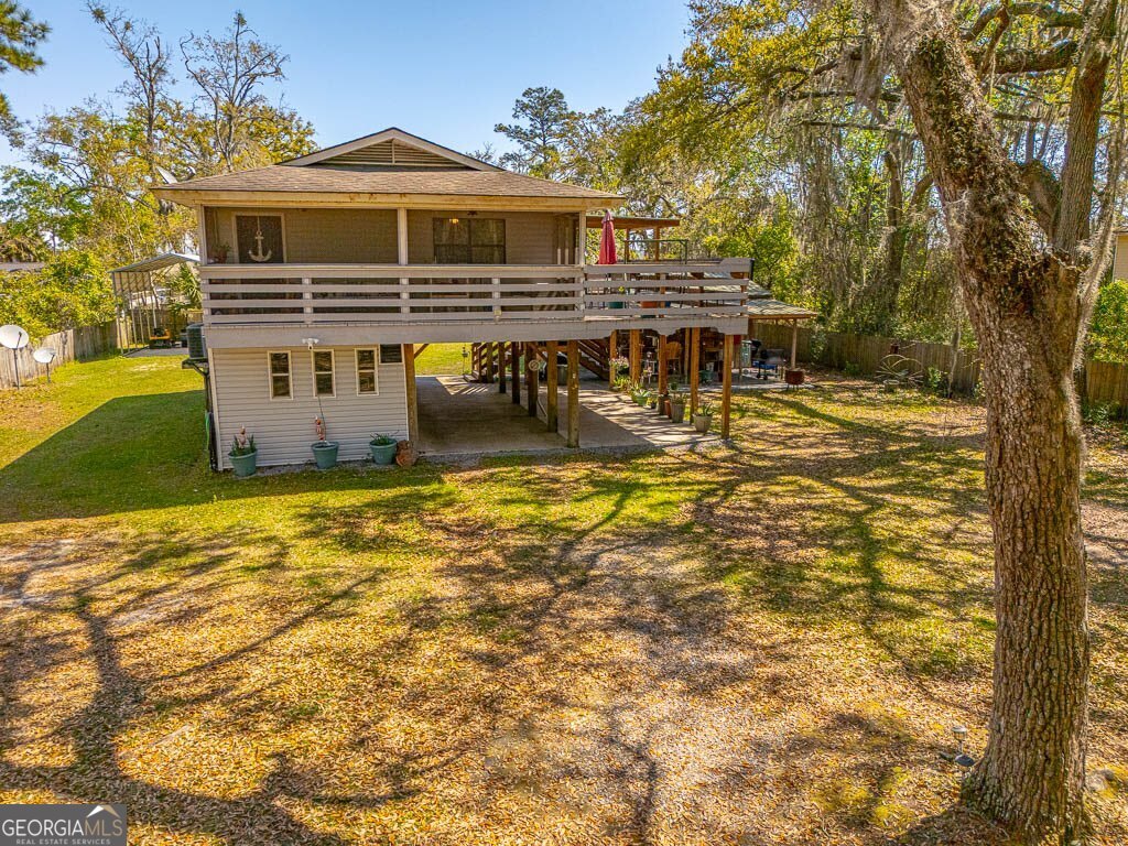 33 Warren Avenue Waverly, GA 31565 - Photo 58 of 63 a view of a house with pool and sitting area