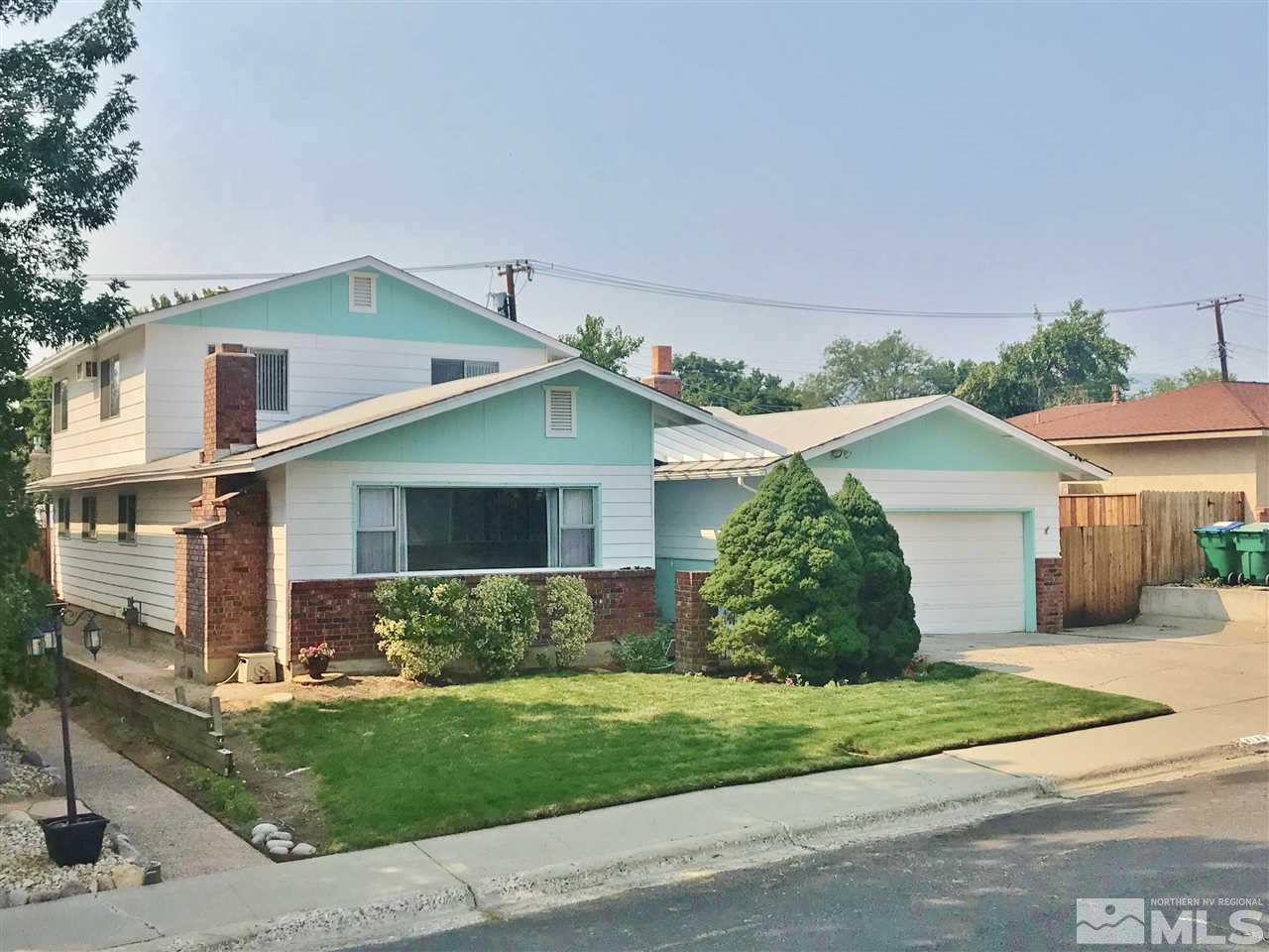 2130 Prince Way Reno, NV 89503 - Photo 25 of 25 a view of a yard in front of a house with plants