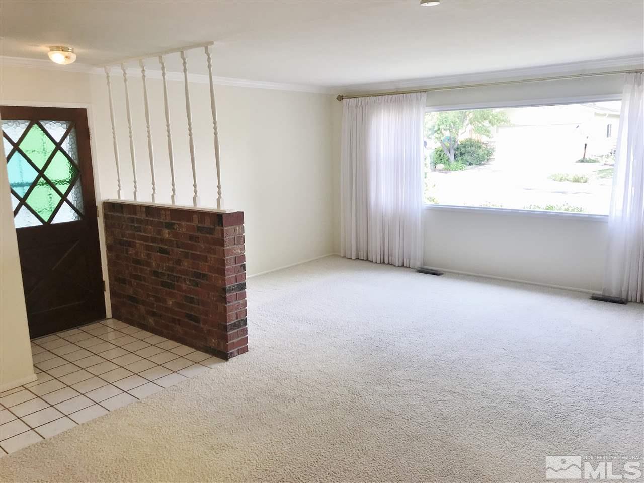 2130 Prince Way Reno, NV 89503 - Photo 3 of 25 an empty room with windows and closet