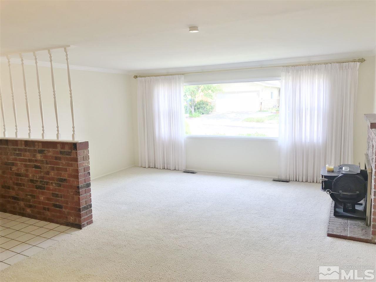 2130 Prince Way Reno, NV 89503 - Photo 5 of 25 an empty room with windows