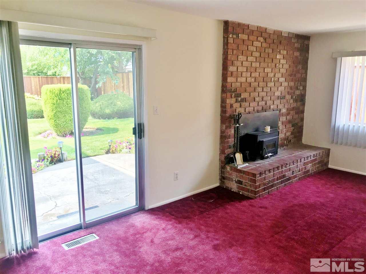 2130 Prince Way Reno, NV 89503 - Photo 8 of 25 a living room with furniture and a floor to ceiling window