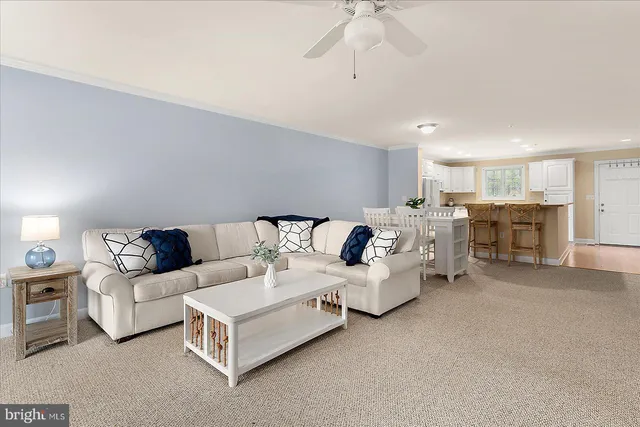 a kitchen with cabinets appliances a sink and a window